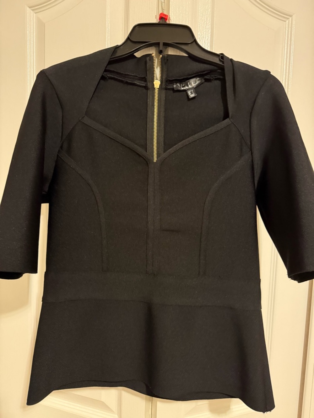 Nicole Miller Black short Sleeve Peplum top